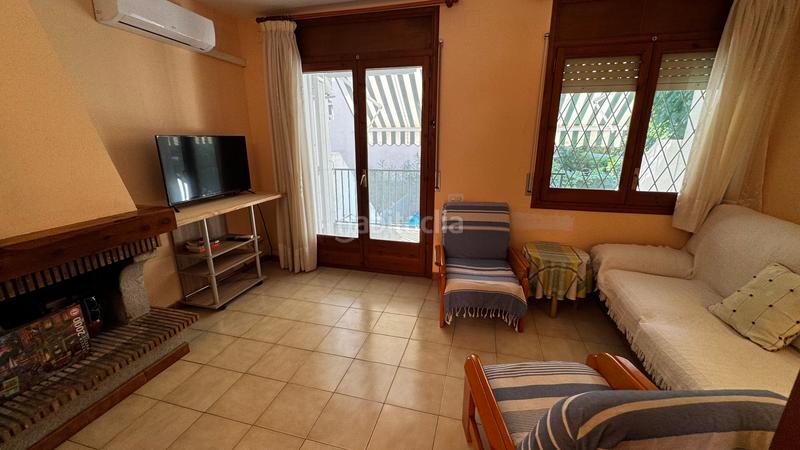 Foto 9d9d7fed-f408-4e8b-91b8-20e51df9d7b8. Location maison jumelée avec cheminée dans Els Munts Torredembarra