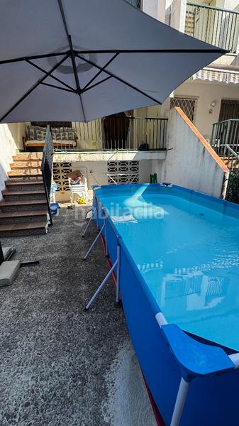 Foto d31bce5d-f805-4bea-a721-06adc1c2721e. Rent semi detached house with fireplace in Els Munts Torredembarra
