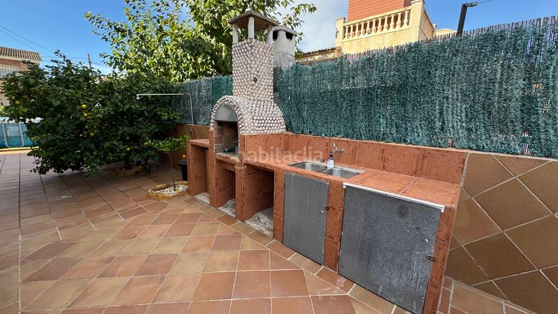 Foto b8f9171a-e3f1-48fb-9bb3-eb5f22cd00bd. Xalet amb xemeneia calefacció aparcament piscina a Torredembarra