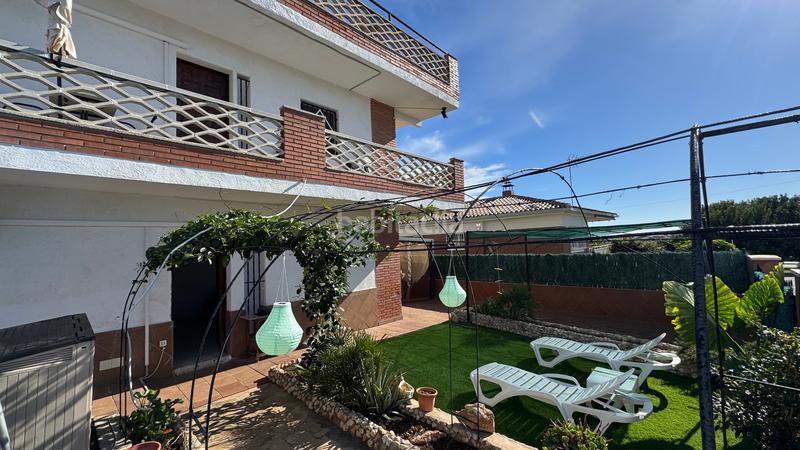 Foto c023f2c8-00fb-49c7-b214-a98d340371ed. Xalet amb xemeneia calefacció aparcament piscina a Torredembarra