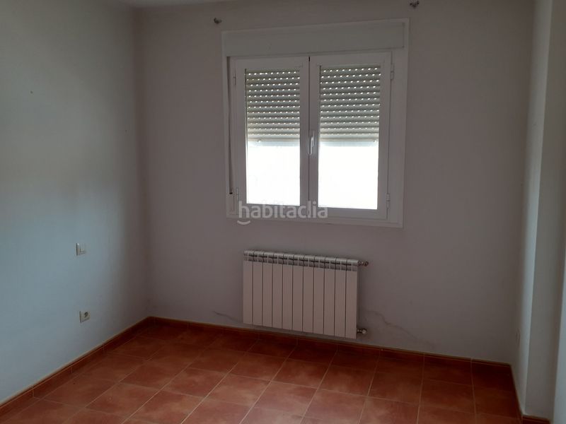 Foto a69ecf31-b41d-413d-b4d9-a76cdfc3ae44. Casa adosada unifamiliar adosado en barrio residencial. en Malagón