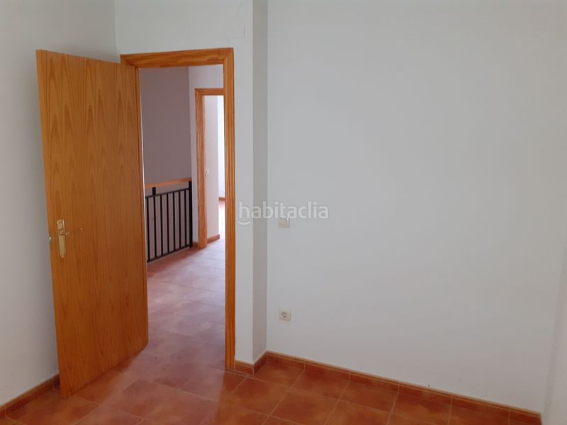 Foto c7c831c9-4874-4661-a70f-ca9c6124097a. Casa adosada unifamiliar adosado en barrio residencial. en Malagón