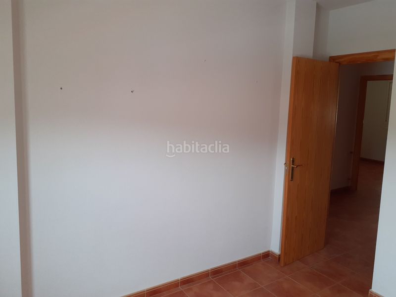 Foto d219870b-c4cf-4ecb-8bf0-9d6b1046141a. Casa adosada unifamiliar adosado en barrio residencial. en Malagón