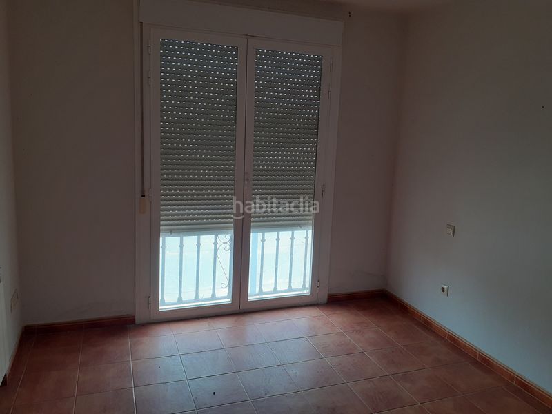 Foto f72d56ab-0d4d-4e19-8326-24140bdac11d. Casa adosada unifamiliar adosado en barrio residencial. en Malagón