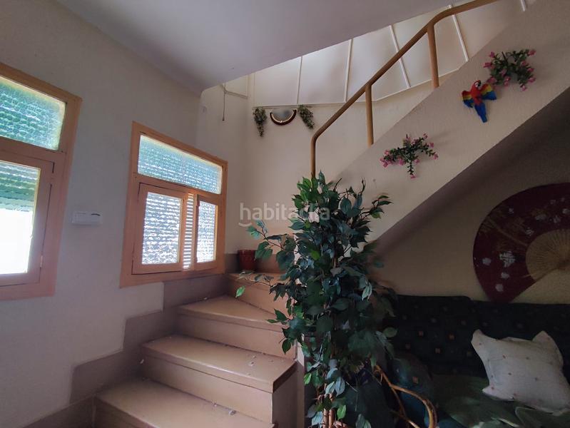 Foto 118d0d23-35b0-4813-8f95-09b9c11ffd4f. Casa aparellada a Manzanares