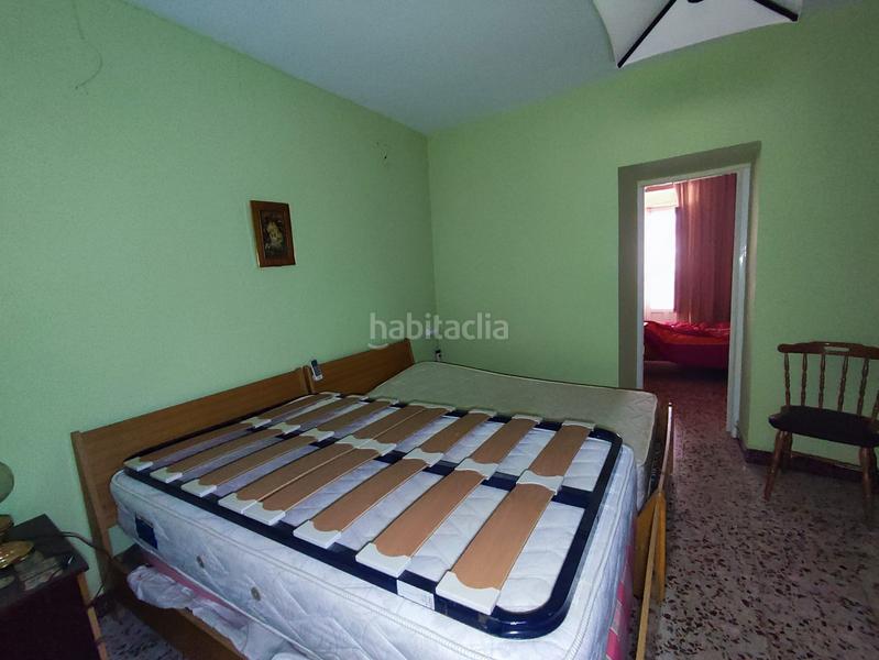 Foto 60591c1c-5495-4e32-814a-f02c00c03bcd. Casa aparellada a Manzanares