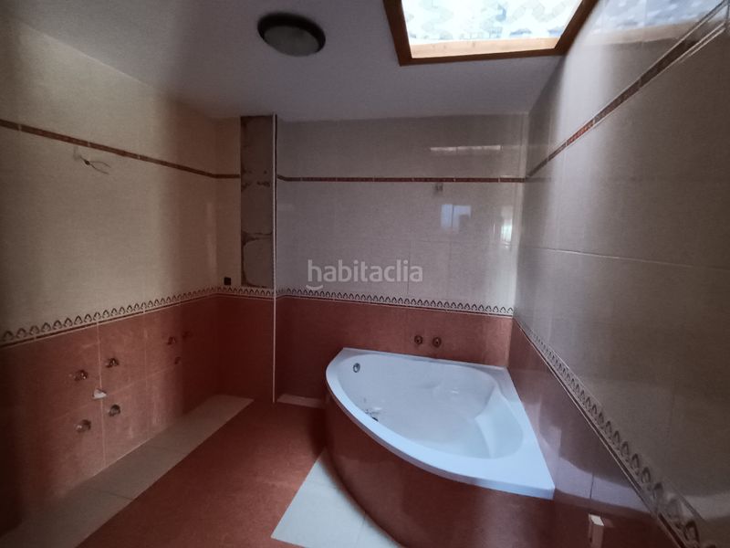 Foto c53a4f57-fb50-4ff0-bf63-d26f8af2b205. Casa amb xemeneia aparcament piscina a Daimiel