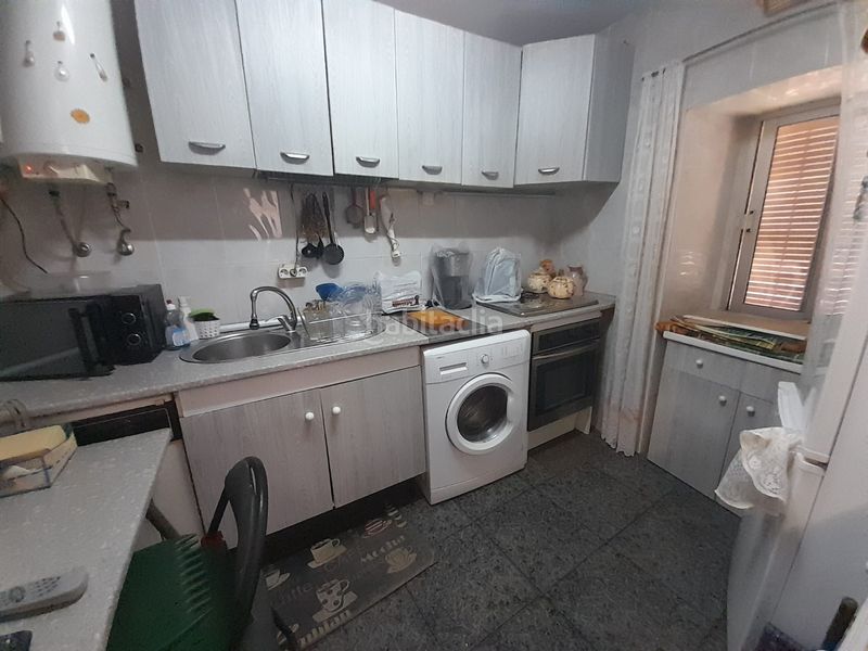 Foto b84ccff9-fac7-437e-90d4-682b3f8d871a. Casa amb calefacció a Centro Puertollano