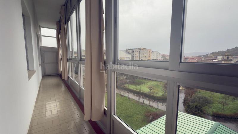 Foto bb6a9358-8d2b-498e-b69c-a7fec253bbd2. Piso descubre tu nuevo hogar en este encantador piso en venta! en Verín