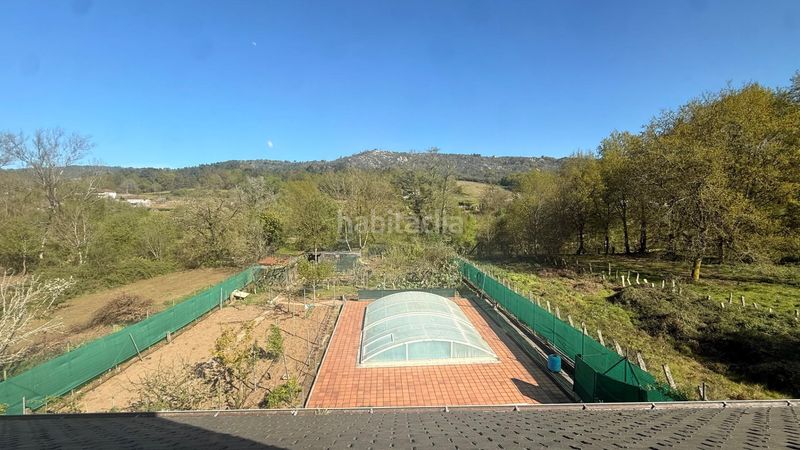 Foto 284646b0-d2ae-4ec0-a9fb-87076406ea8b. Xalet amb aparcament piscina a Leiro