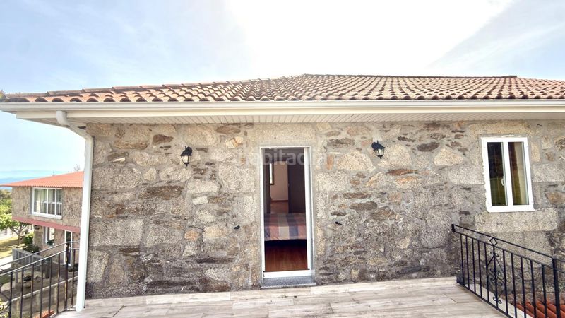 Foto 5a68a8ff-fc05-47d0-a578-4b634178b0f8. Casa amb aparcament a Ramirás