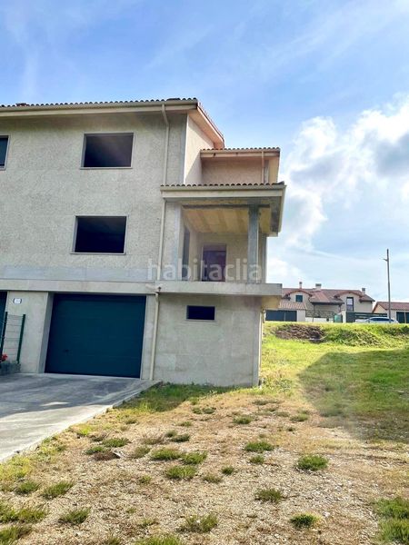 Foto 457b4933-5067-4605-847b-f9bc7677a332. Casa aparellada amb calefacció piscina a Merca (A)