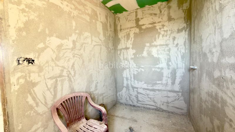 Foto 59036c2c-a3e0-432a-8488-3e67a6549383. Casa aparellada amb calefacció piscina a Merca (A)