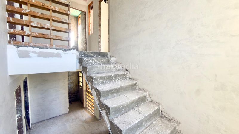 Foto 676fa93f-1b5a-4ab3-8823-d0f365017561. Casa aparellada amb calefacció piscina a Merca (A)