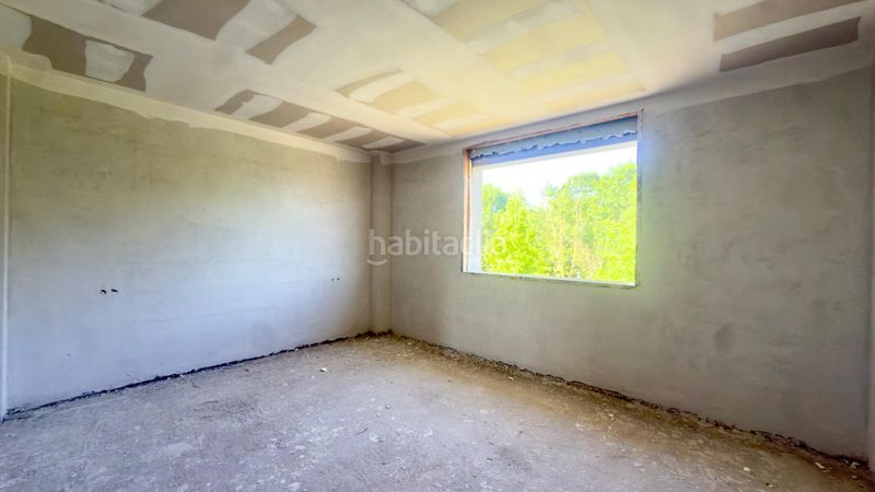 Foto 8348d956-55ac-4128-9683-ab5bbdc66ee7. Casa aparellada amb calefacció piscina a Merca (A)