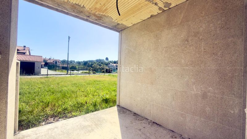 Foto 85a8f0fe-7e0e-489f-880d-1a443cd33f76. Casa aparellada amb calefacció piscina a Merca (A)