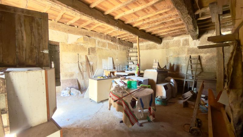 Foto 5373d76b-489d-40ef-bd4e-55441f72e06e. Casa  de piedra registrada para rehabilitación integral en a merca cerca de las piscinas municipales en Merca (A)
