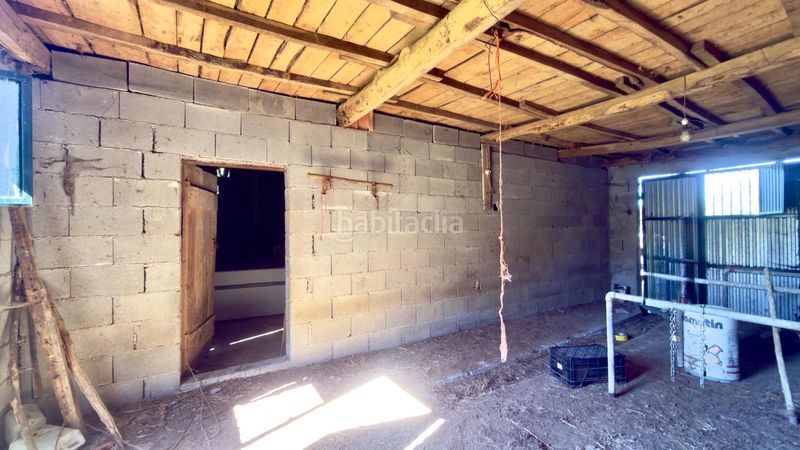 Foto 6ee928ca-7dbb-48af-8c66-b2f9ce89c828. Casa  de piedra registrada para rehabilitación integral en a merca cerca de las piscinas municipales en Merca (A)