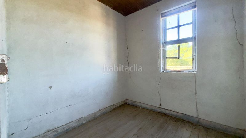Foto 97f2cc54-9672-4dda-bd6c-9ee9f58ea4be. Casa  de piedra registrada para rehabilitación integral en a merca cerca de las piscinas municipales en Merca (A)