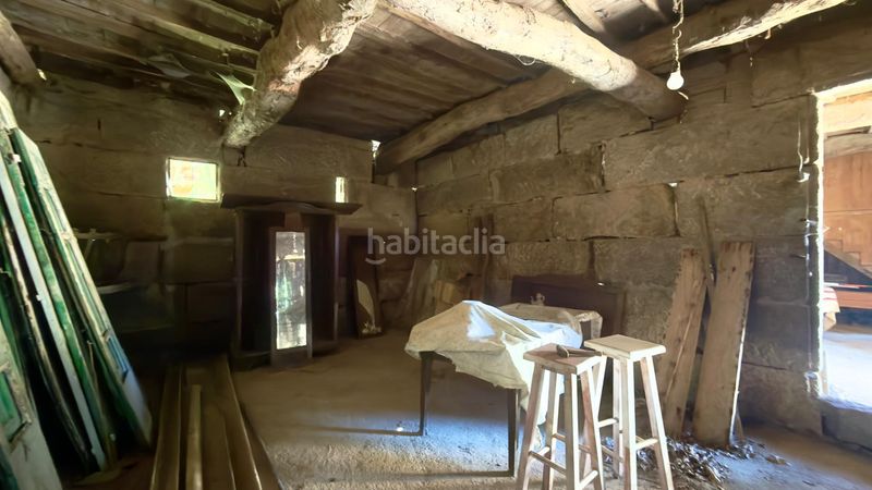 Foto b3d1bd9e-c082-41fb-aba3-33f029048ebf. Casa  de piedra registrada para rehabilitación integral en a merca cerca de las piscinas municipales en Merca (A)