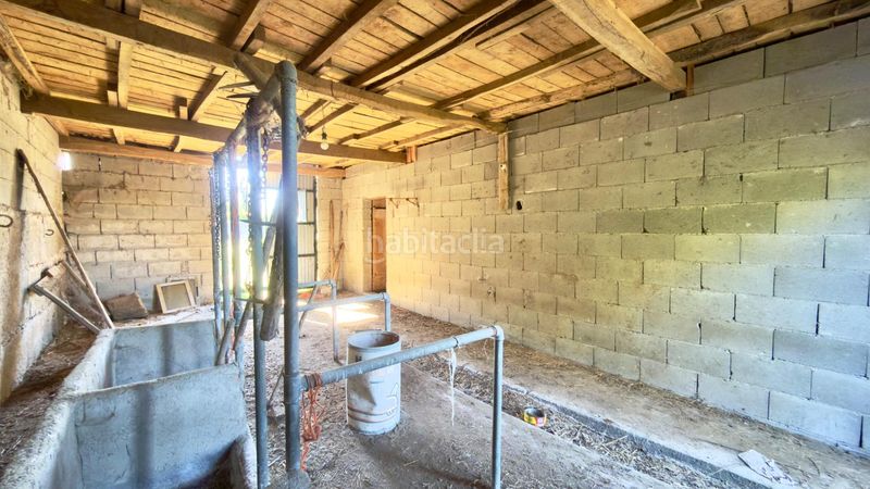 Foto d51bf529-e7fc-45be-82b9-c20751ea666b. Casa  de piedra registrada para rehabilitación integral en a merca cerca de las piscinas municipales en Merca (A)