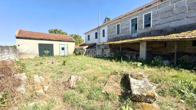 Foto dd9c6478-d4c7-42a3-a8ea-f754403b471f. Casa  de piedra registrada para rehabilitación integral en a merca cerca de las piscinas municipales en Merca (A)