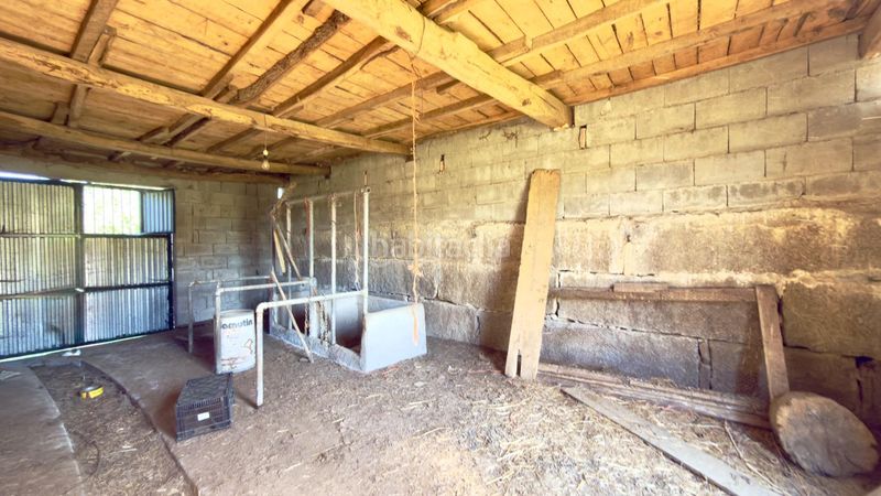 Foto ef2ef401-75c0-4348-8539-24782dd73f2f. Casa  de piedra registrada para rehabilitación integral en a merca cerca de las piscinas municipales en Merca (A)