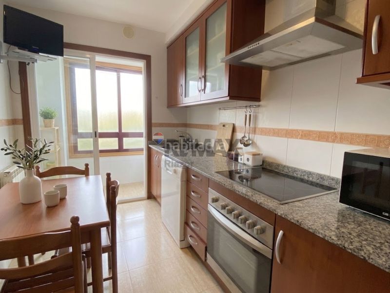 Foto efdc8986-a88c-4f07-8f44-e853b9dfb895. Pis amb calefacció aparcament a O Milladoiro Ames