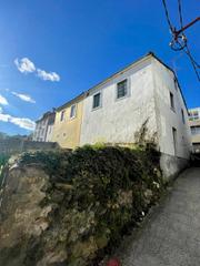 Casa aparellada a Calle da costa 25. Chalet de piedra con terreno urbanizable y vistas al mar