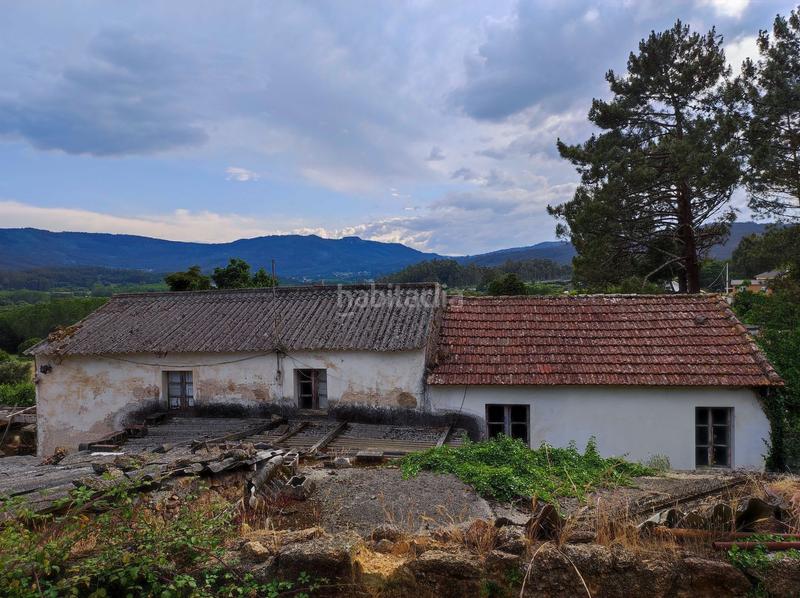 Foto da40c7cc-fc40-4072-8e49-7a3c7d02509a. Maison avec parking dans Parroquias Rurales Culleredo