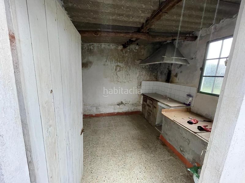 Foto f08dc89c-6e6e-4823-a180-3c72b2b8c9db. Casa adossada amb aparcament a A Gándara Narón