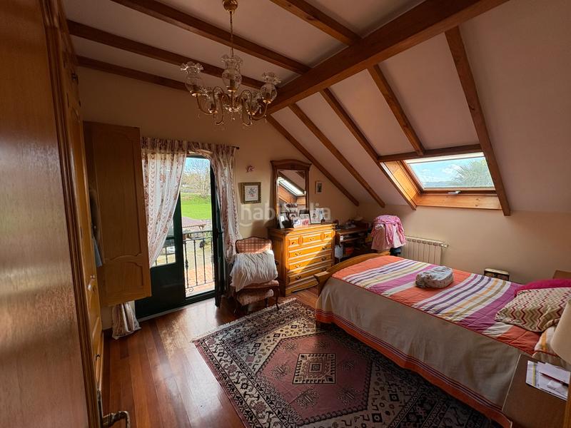 Foto 2a27f7cf-1af8-45f2-b2cb-970e415c2494. Chalet con camino riscaldamento parcheggio in A Gándara Narón