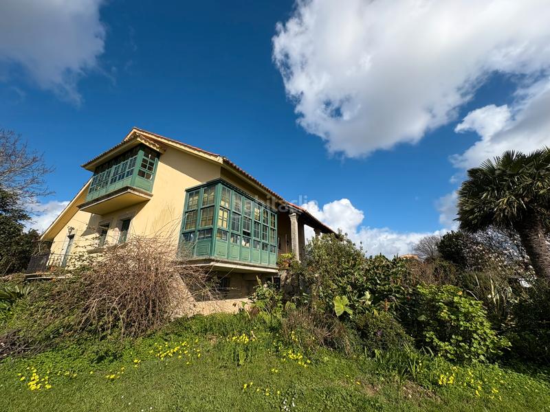 Foto 504a7225-389c-4aea-87a5-24b7a2d23a9f. Chalet con camino riscaldamento parcheggio in A Gándara Narón