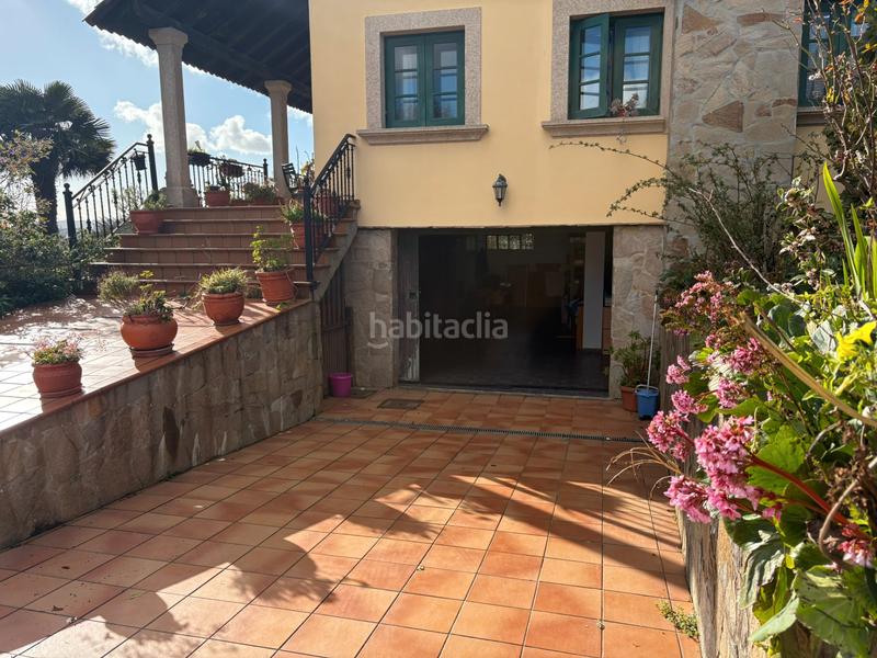 Foto 726c6a3e-6eea-406a-91bc-221c43ae1d5c. Chalet con camino riscaldamento parcheggio in A Gándara Narón