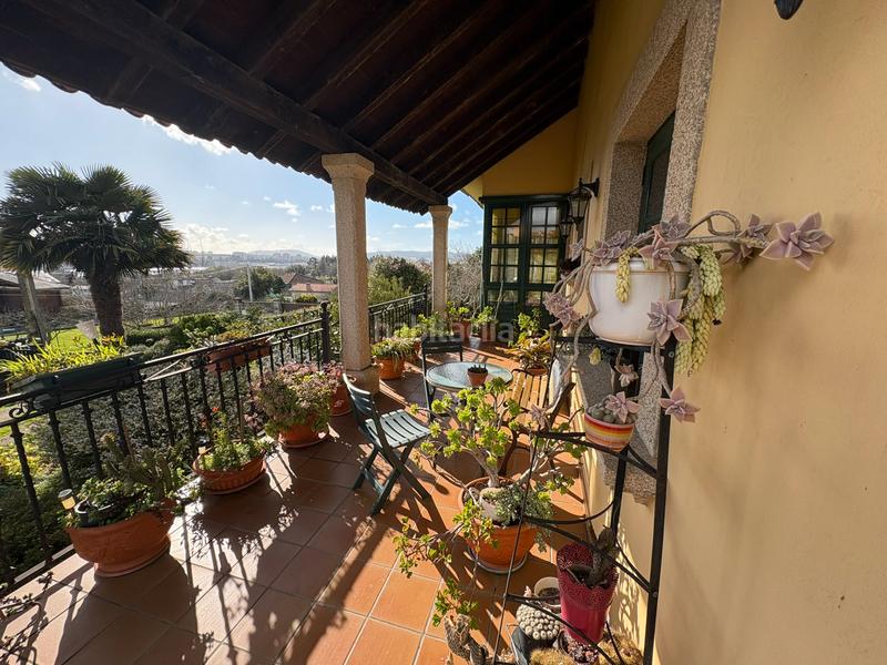 Foto ae9c2fd6-5801-4cfd-b43a-0291bff6cab4. Chalet con camino riscaldamento parcheggio in A Gándara Narón