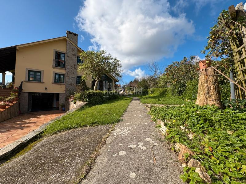 Foto c31489bf-ed8e-4a97-ba32-00f1d5e49e08. Chalet con camino riscaldamento parcheggio in A Gándara Narón