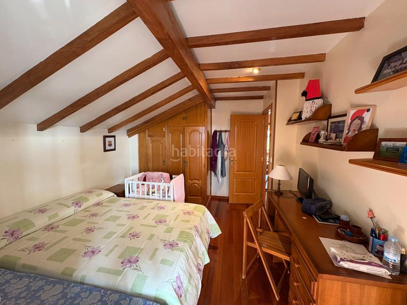 Foto c69aa123-1f79-4399-bbe9-4252d396eafe. Chalet con camino riscaldamento parcheggio in A Gándara Narón