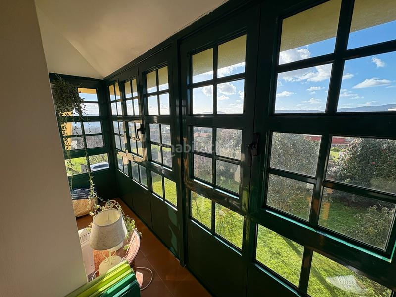 Foto cd31aaa7-210f-4129-aa4a-0bff78595783. Chalet con camino riscaldamento parcheggio in A Gándara Narón