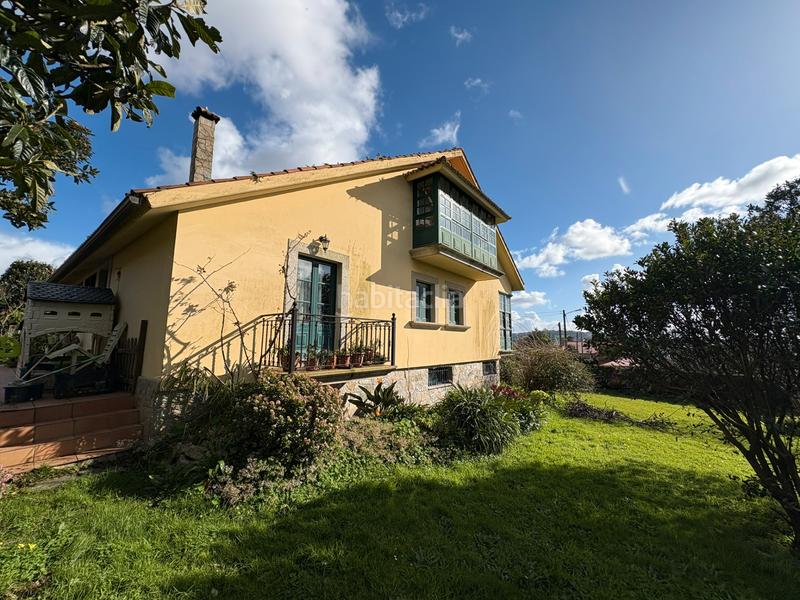 Foto d3655c9d-4ad2-4011-a0f4-8c511c005244. Chalet con camino riscaldamento parcheggio in A Gándara Narón