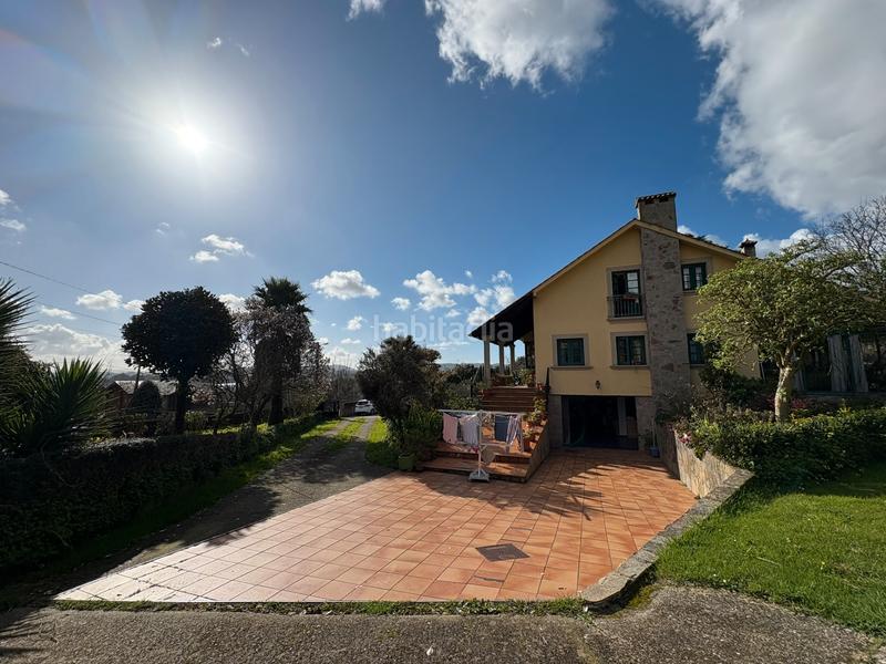 Foto e9f459dd-01d2-48a0-9fba-0fe43de97237. Chalet con camino riscaldamento parcheggio in A Gándara Narón