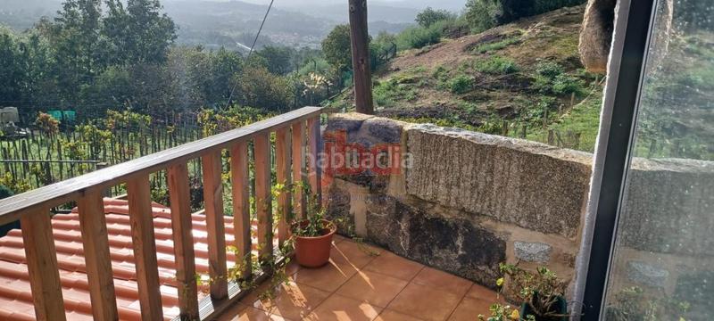 Foto 1409ef80-9100-46cb-9a43-5fed1ee2fb89. House with heating parking in Barrocanes Ourense