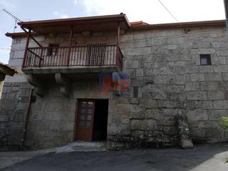 Masia a Toén