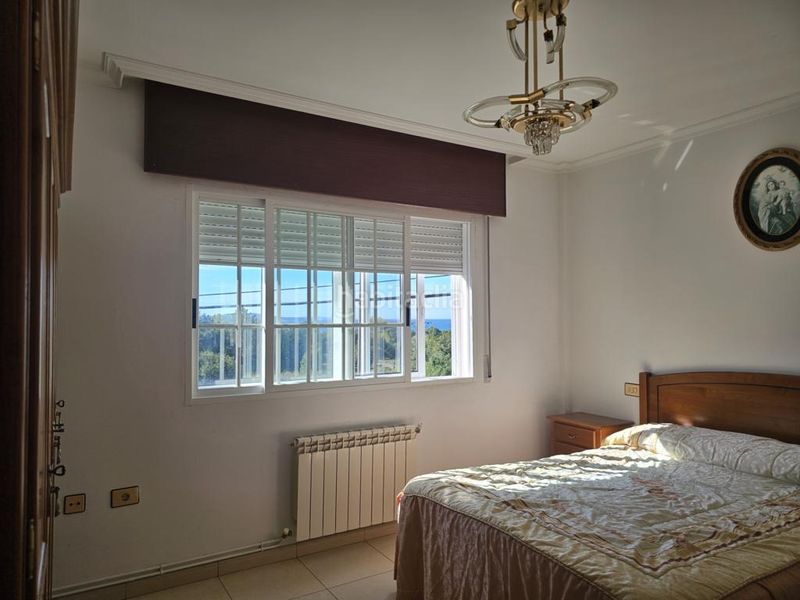 Foto f847e5d1-dcea-432a-8824-ac1b9693a6ff. Casa a lugar 15 a Boiro