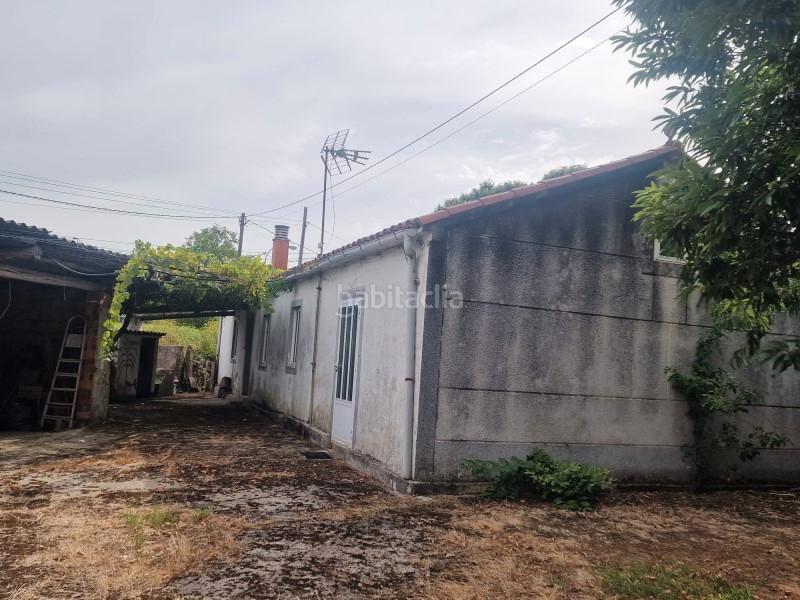 Foto 9f9b6543-d63b-4836-8d1e-b2292199abbe. Casa en rúa do piñeiral 1 vende casa unifamiliar en santa maria en Arzúa