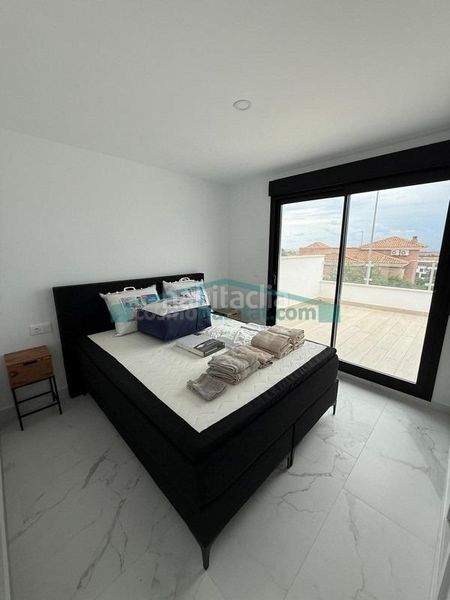 Foto 21eadee5-fc4e-4979-b8c6-4529aabf77c4. Casa adossada amb aparcament piscina a Valle del Sol Mutxamel