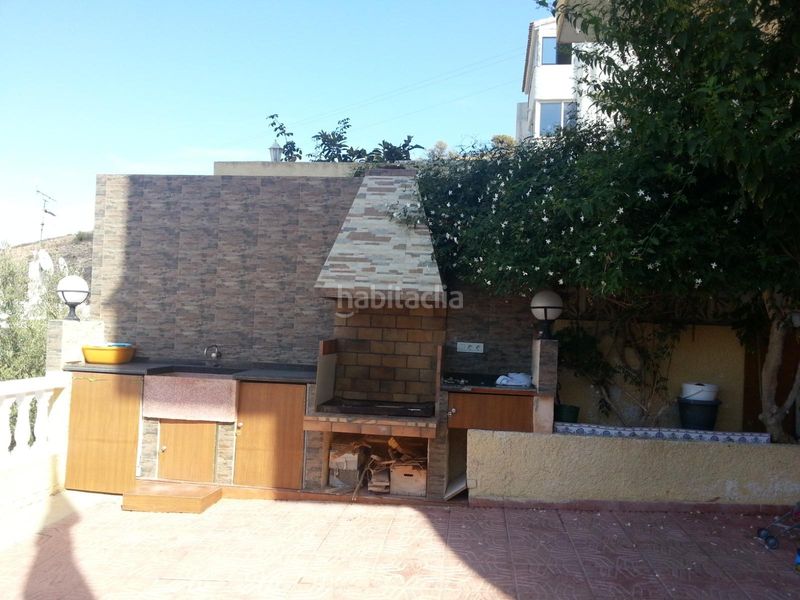 Foto 26331081-cee2-480a-ad85-2af14da5f91e. Casa adossada amb aparcament piscina a Sierra Helada Benidorm