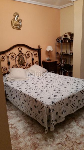 Foto b84f4054-7786-483d-9c61-221dd27b1e80. Casa adossada amb aparcament piscina a Sierra Helada Benidorm