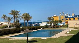 Apartament a Punta Prima. Primera línea de playa en punta prima torrevieja  apartamento re