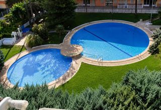 Appartement in Daimús. Bajo con terraza privada a pocos metros de la playa de daimús