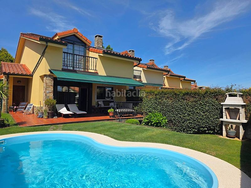 Foto 12a9842c-1683-4669-947c-161e2d59946f. Casa aparellada amb calefacció aparcament a Sada
